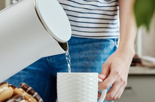 asmr meaning image of woman pouring tea